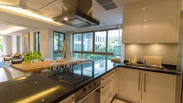 Superior Apartment, 3 Bedrooms, Pool View, Beachfront | Private kitchen | Full-sized fridge, microwave, oven, stovetop