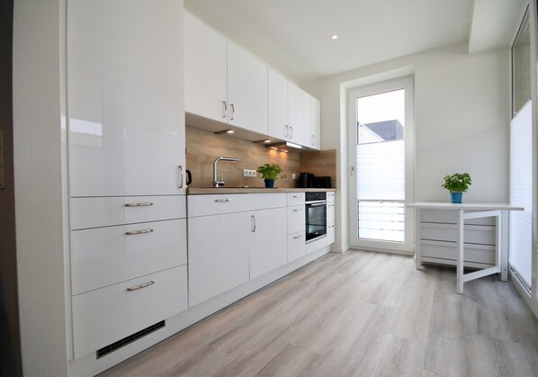 Sonnengarten 4 - Sonnenveranda | Private kitchen | Fridge, microwave, oven, stovetop