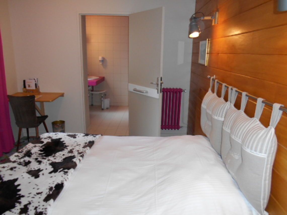 Premium bedding, blackout curtains, iron/ironing board