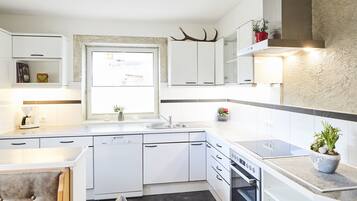 Family Condo | Private kitchen | Fridge, microwave, oven, stovetop