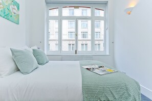 Apartamento, 2 quartos | Ferros/tábuas de passar roupa, Wi-Fi de cortesia, roupa de cama