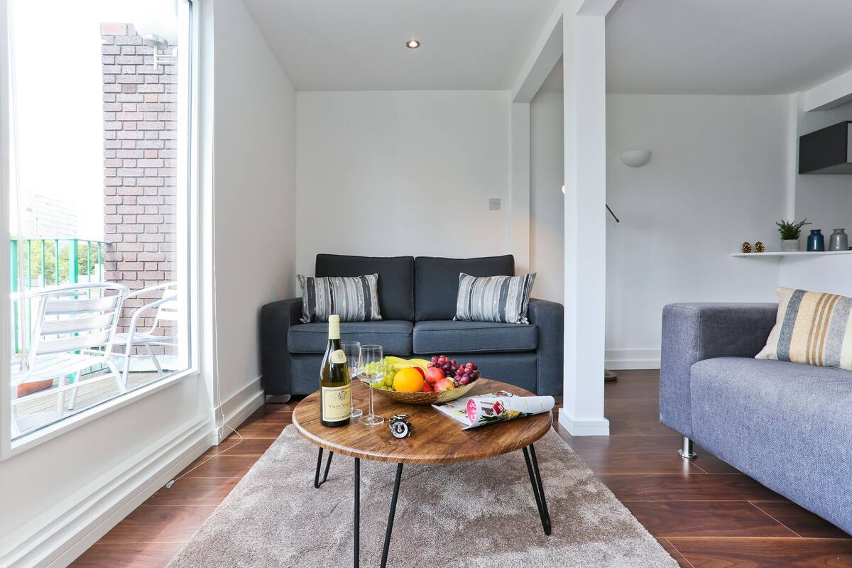 Deluxe Apartment, 2 Bedrooms | Living area | Flat-screen TV