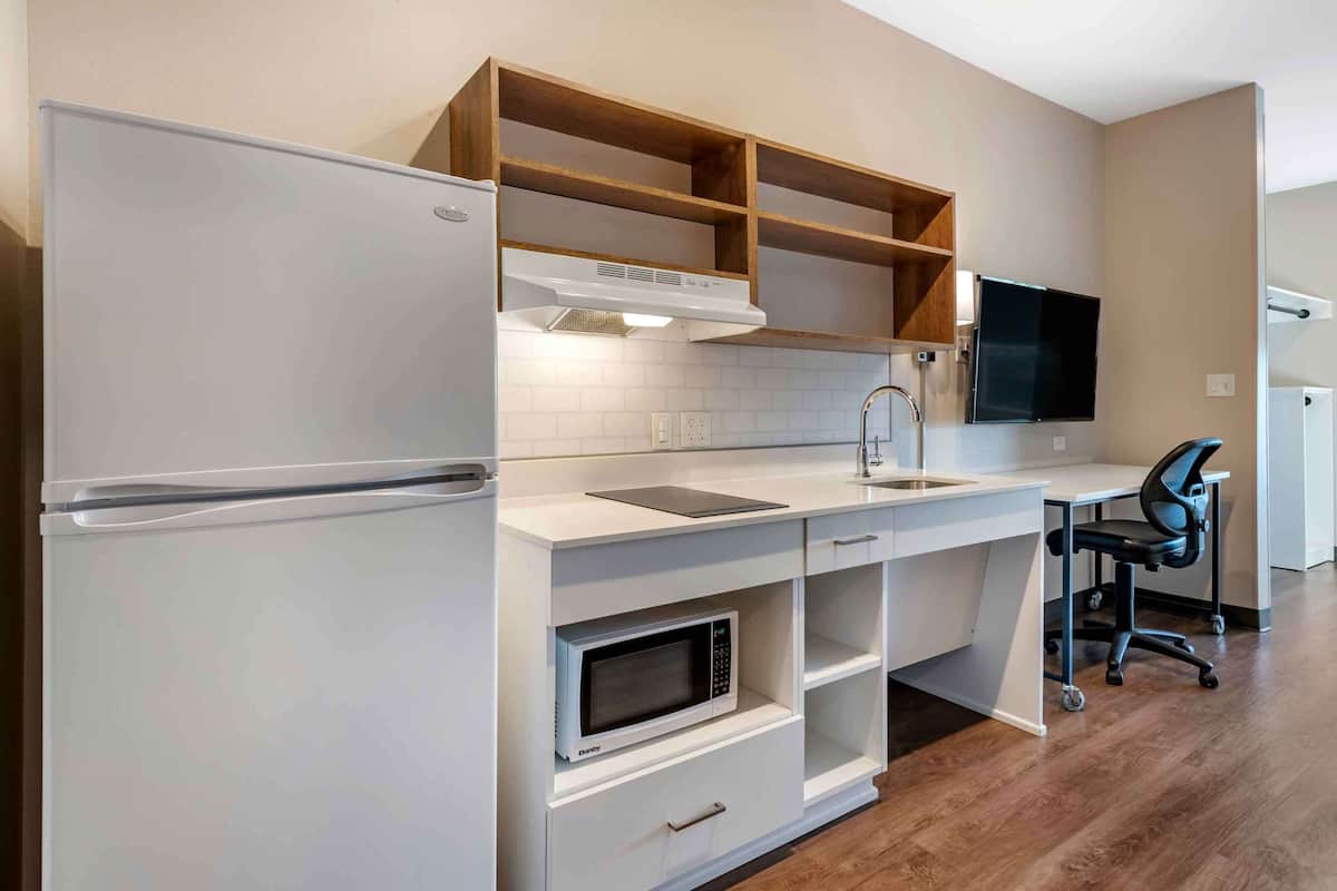 premium bedding, desk, iron/ironing board, bed sheets