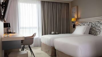 Hypo-allergenic bedding, minibar, in-room safe, desk