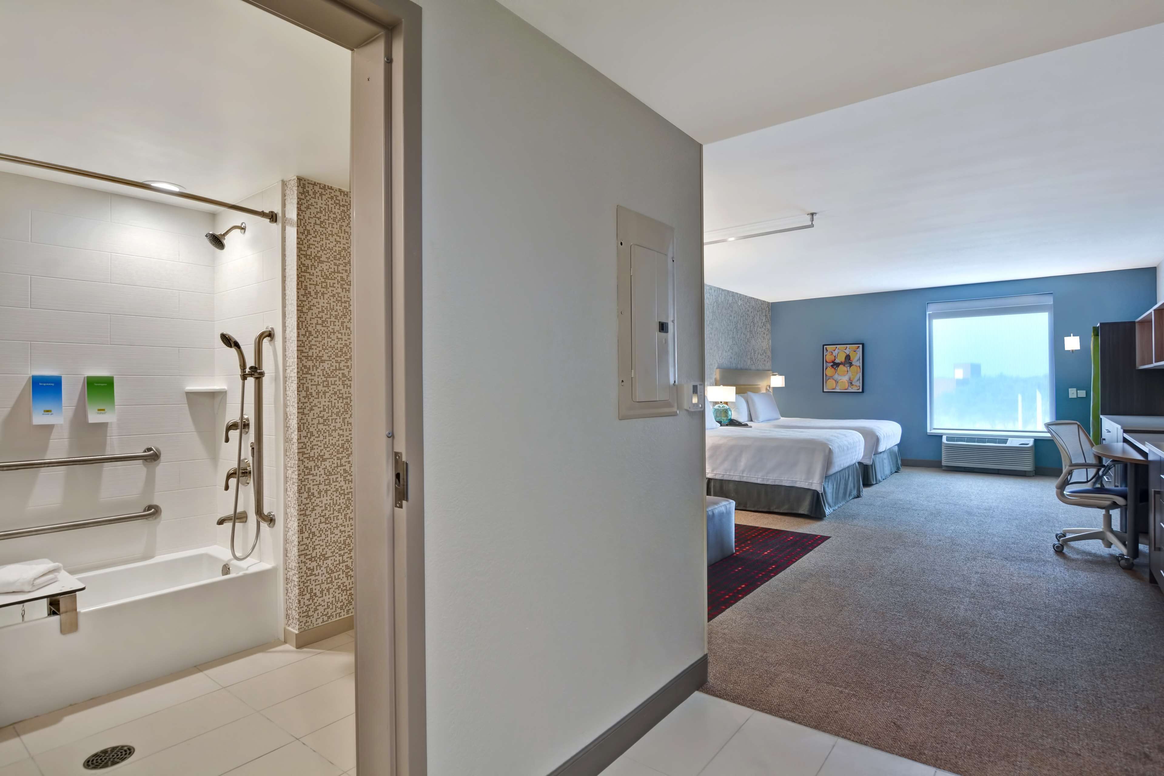 standard studio, 2 queen beds, accessible, bathtub (mobility & hearing) | bathroom | hair dryer, towels, soap, shampoo
