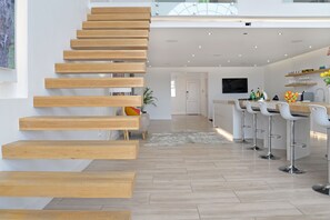 Design Penthouse, 2 Bedrooms, City View | Private kitchen | Full-size fridge, microwave, oven, stovetop