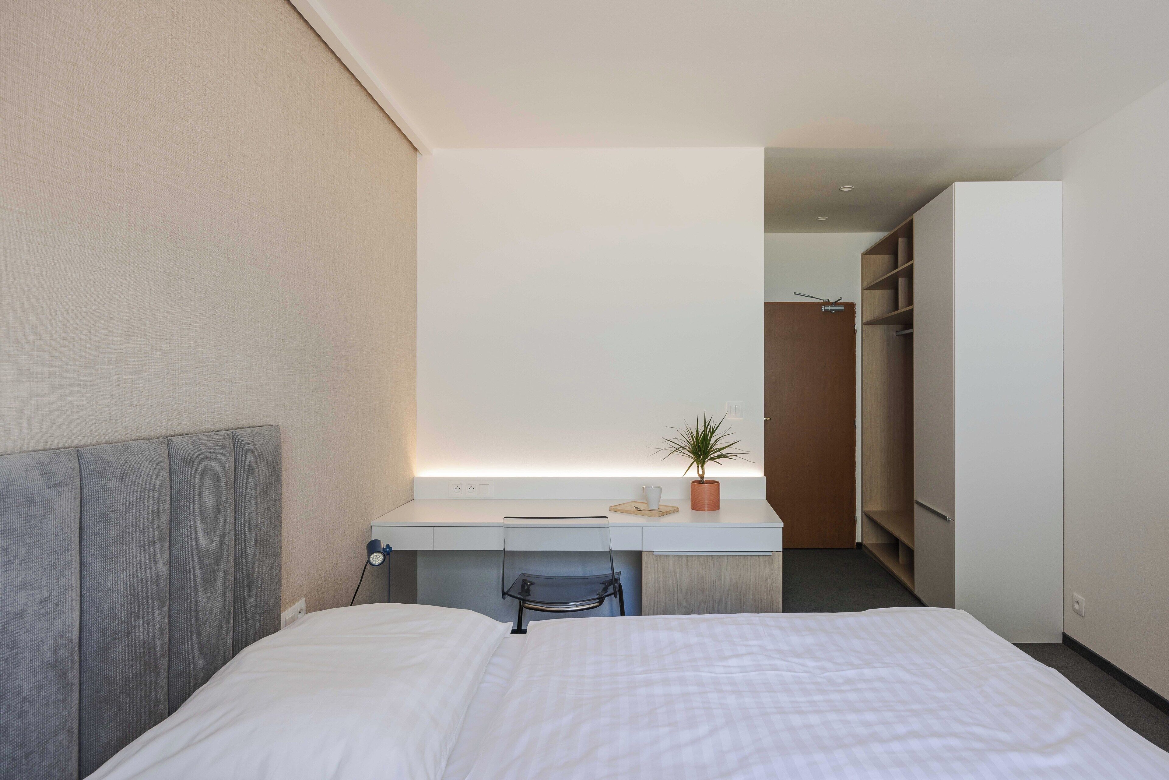 Laptop workspace, free WiFi, bed sheets