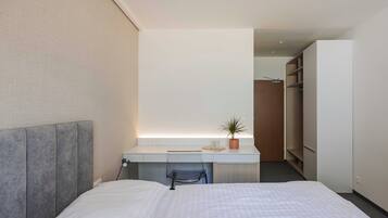 Laptop workspace, free WiFi, bed sheets