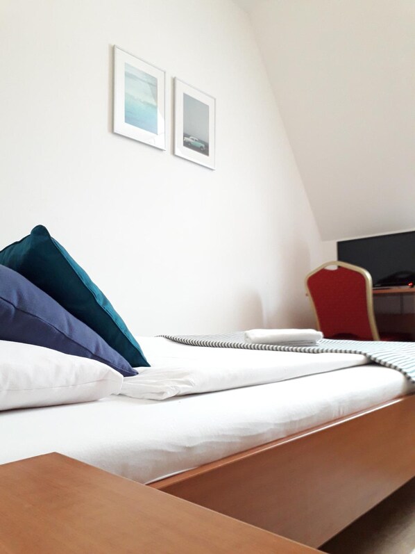 Laptop workspace, free WiFi, bed sheets