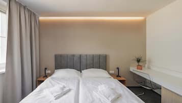 Laptop workspace, free WiFi, bed sheets