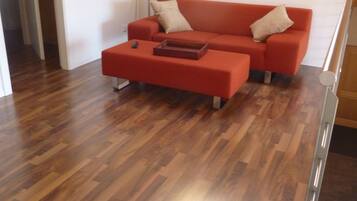 Luxury Apartment, 4 Bedrooms | Living area | Flat-screen TV, fireplace