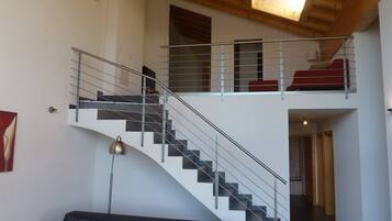 Luxury Apartment, 4 Bedrooms | Living area | Flat-screen TV, fireplace