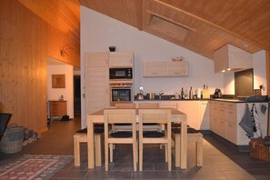 Comfort Apartment | Private kitchen | Full-sized fridge, microwave, oven, stovetop