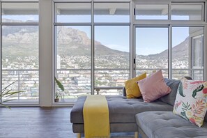 City Apartment | Living area | Flat-screen TV - Hazel By Stay Amazing (Cape Town)