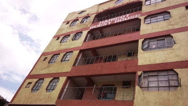 A multi-story building with the sign "Haricot Guest House" indicating it is a guest accommodation. - Haricot Guest House (Murang'a)