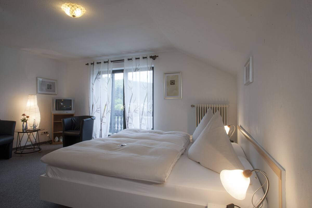 Desk, blackout curtains, free cots/infant beds, rollaway beds