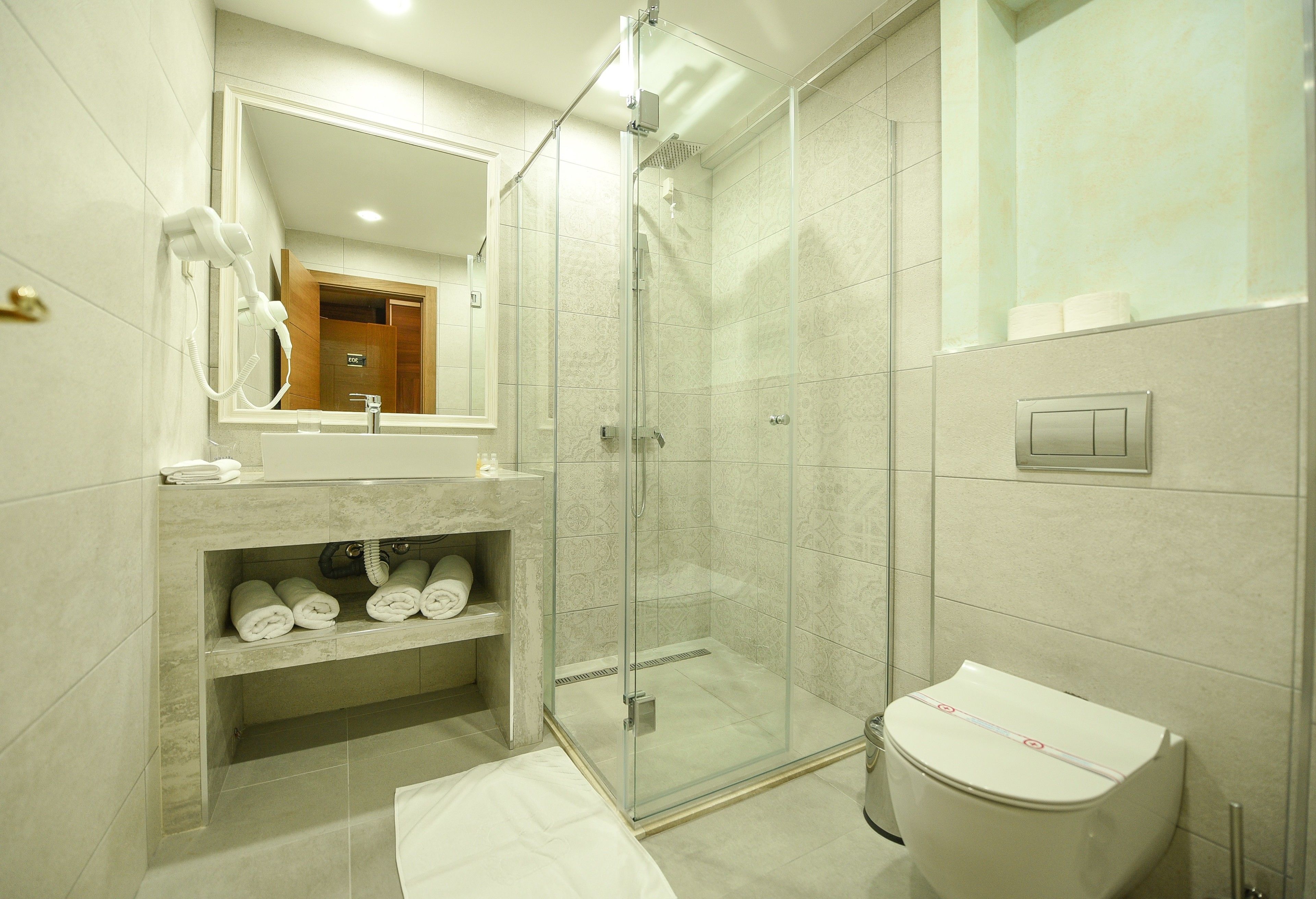 shower, free toiletries, hair dryer, bathrobes