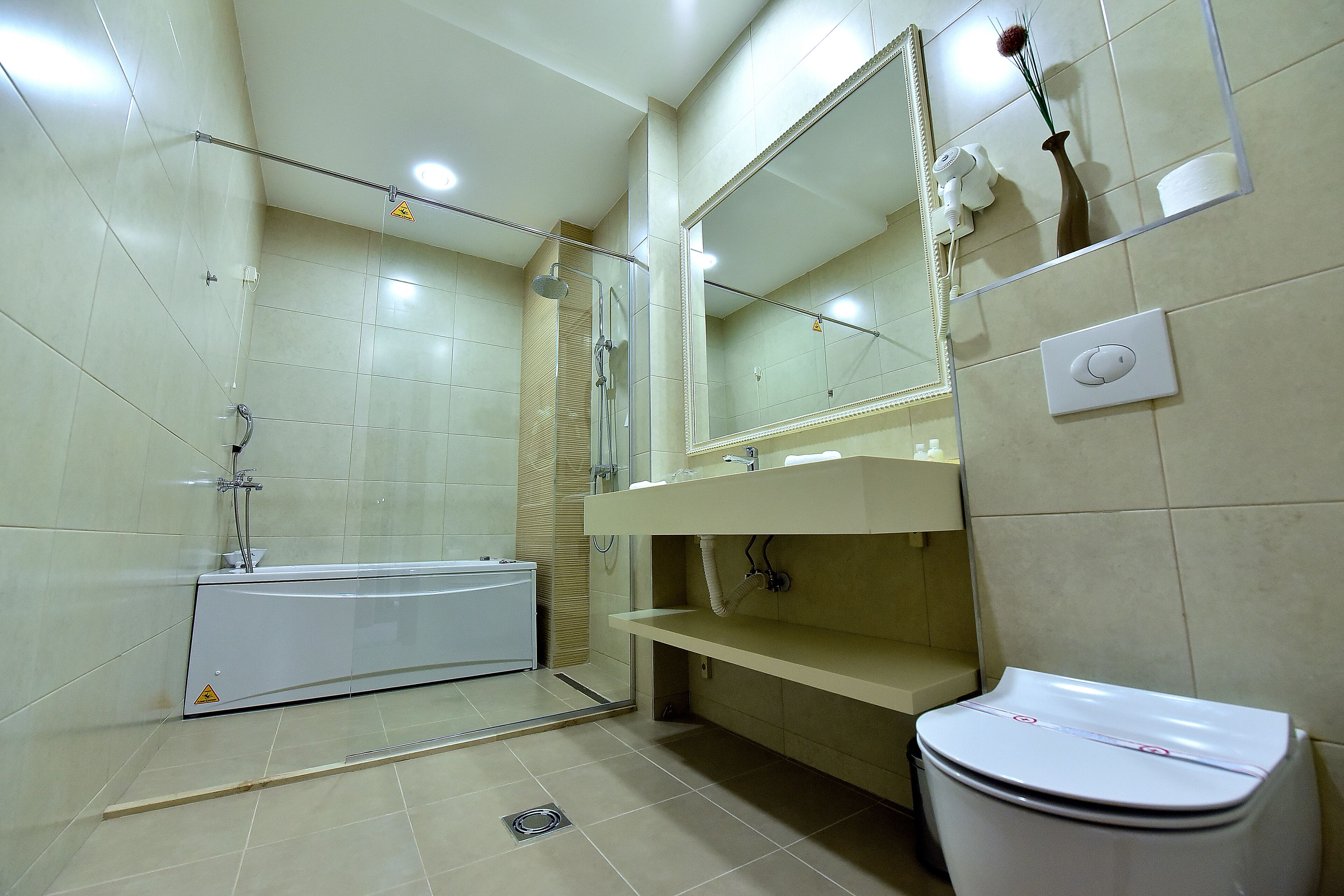 family quadruple room | bathroom | shower, free toiletries, hair dryer, bathrobes