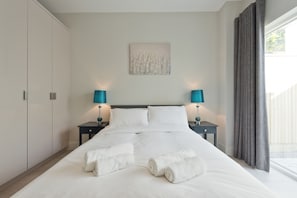 Casa City | 4 dormitorios, tabla de planchar con plancha, wifi gratis y ropa de cama