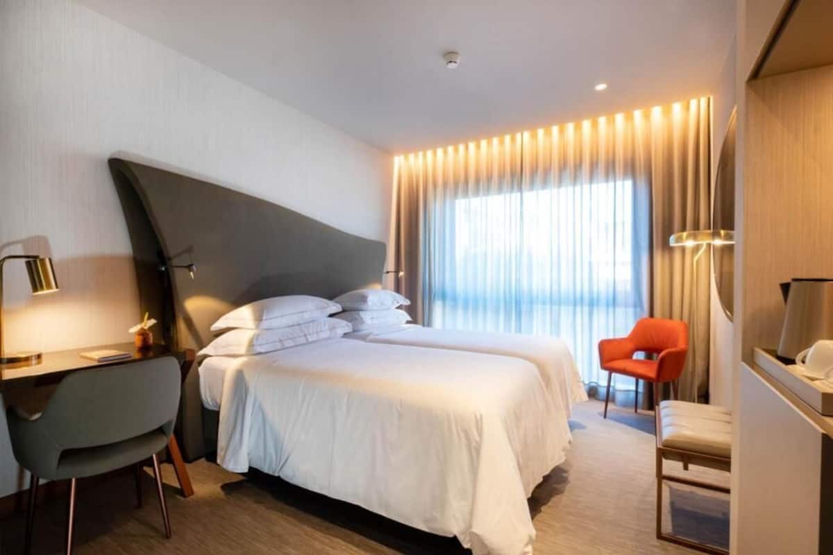 Premium bedding, down comforters, memory foam beds, minibar