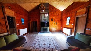 Superior Bungalow, 3 Bedrooms | Living room | Fireplace - Asproface Boutique Hotel (Çaykara)