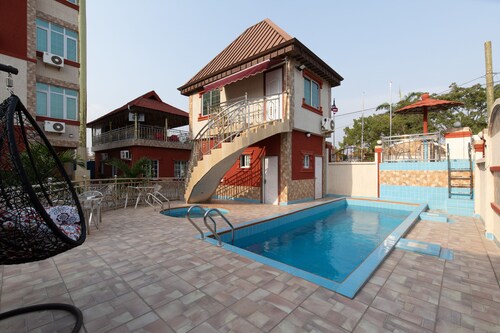 AG Hotel and Suites