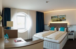 Hypo-allergenic bedding, desk, blackout curtains, iron/ironing board