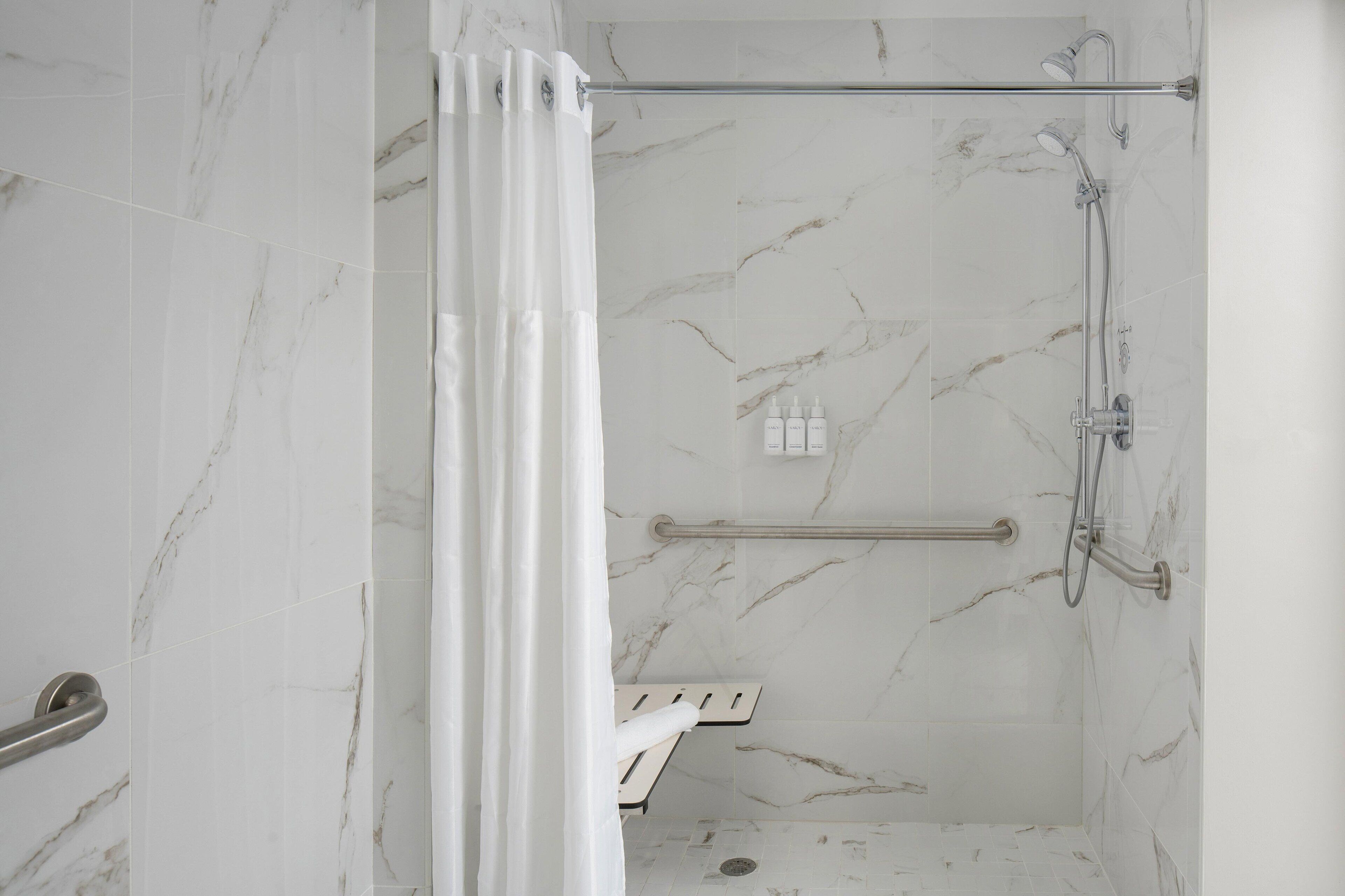 separate bathtub and shower, free toiletries, hair dryer, bathrobes