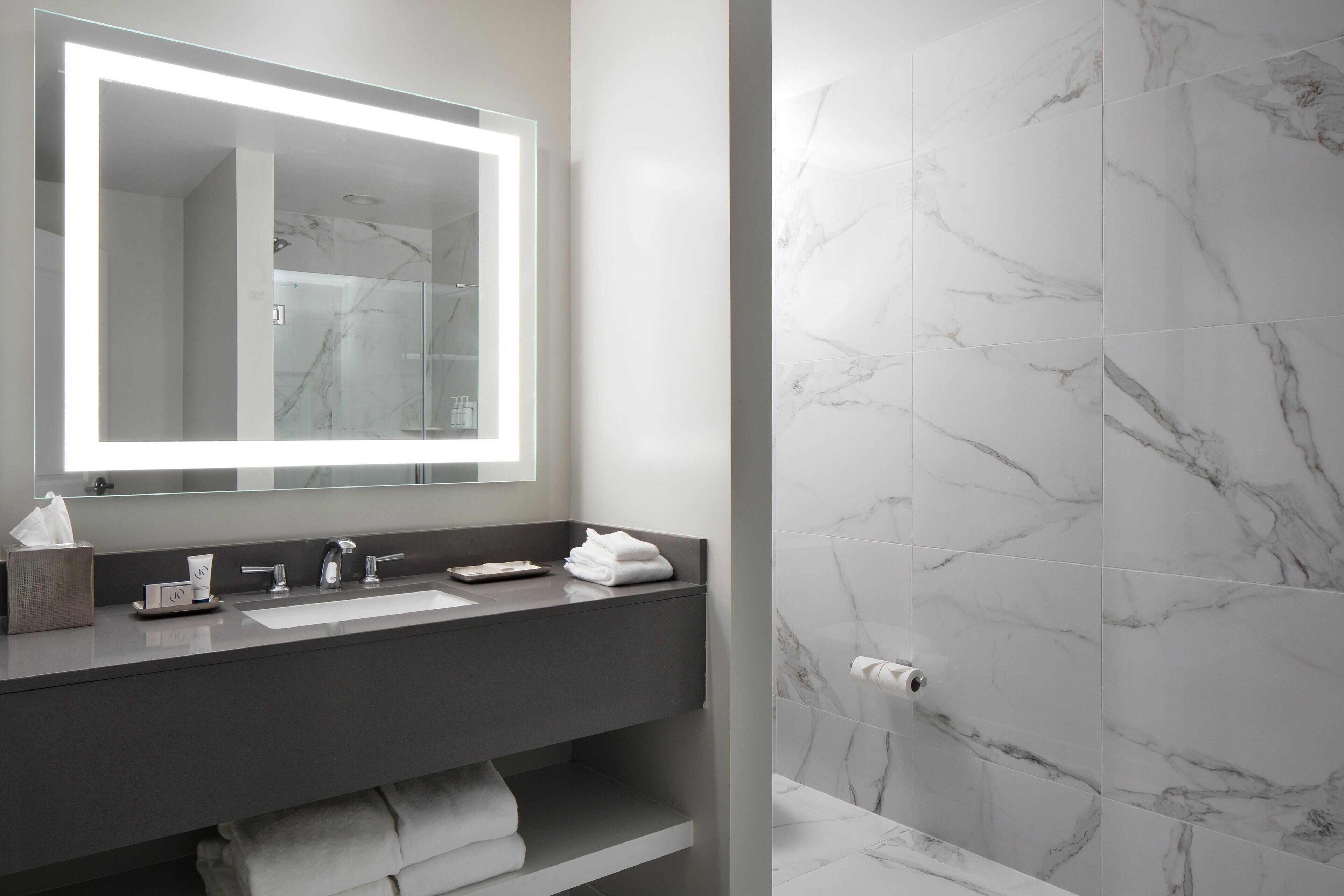 separate bathtub and shower, free toiletries, hair dryer, bathrobes