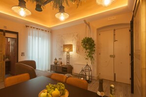 Suite Deluxe | Aire de séjour | Téléviseur à écran plat