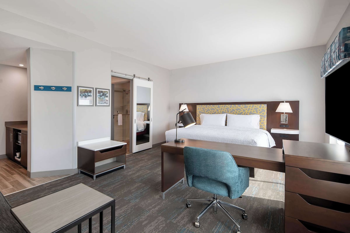 studio, 1 king bed, refrigerator & microwave (wet bar) | 1 bedroom, desk, laptop workspace, blackout curtains