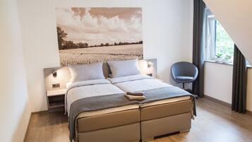 Junior Suite, Garden View | Desk, blackout curtains, soundproofing, free WiFi