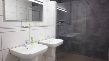 Junior Suite, Garden View | Bathroom | Shower, hair dryer, towels