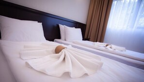Habitación estándar con 1 cama matrimonial o 2 individuales | Sábanas italianas Frette y ropa de cama de alta calidad 