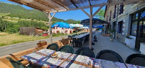 Breakfast, lunch, dinner served; local cuisine
