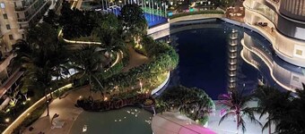 Romantic and Charming Beachfront 1BR at Azure Urban Resort with a Wave Pool