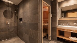 Shower, hair dryer, towels, toilet paper