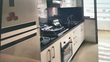 Microwave, coffee/tea maker, cookware/dishes/utensils