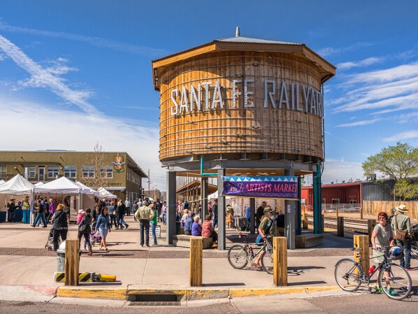 A wooden structure labeled "Santa Fe Railway" with a covered market area underneath. - Short stroll to the historic plaza, Canyon Road & Railyard District Restaurants (Santa Fe)