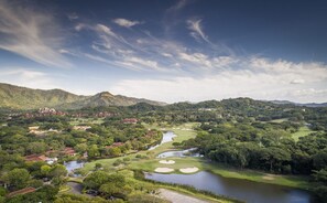 Play a round amidst rolling hills and dense forests, with scenic views and challenging greens.