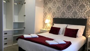2 habitaciones, tabla de planchar con plancha, wifi y ropa de cama
