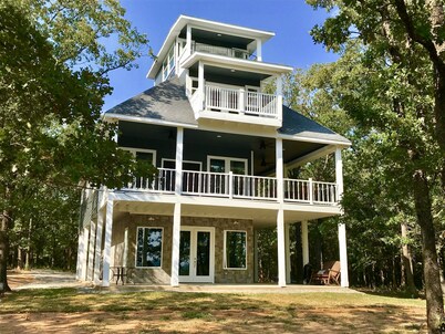 Tree Top Lake Views with lake access for swimming fishing boating 250 ft away!