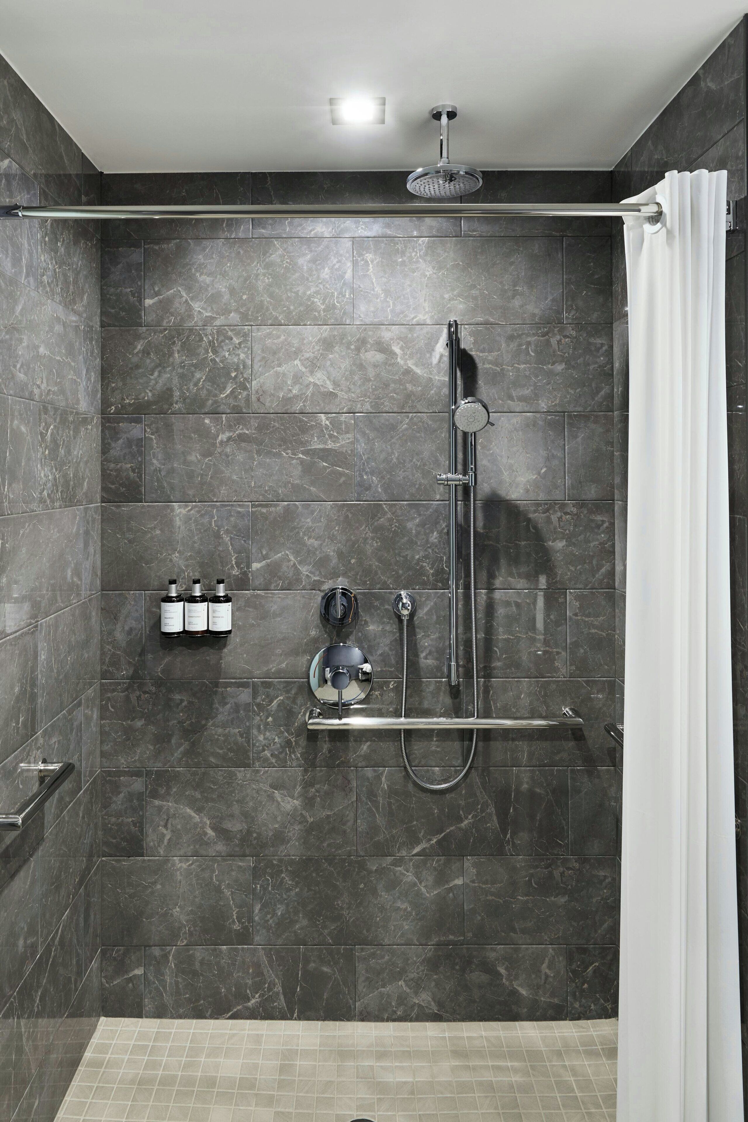 rainfall showerhead, free toiletries, hair dryer, towels