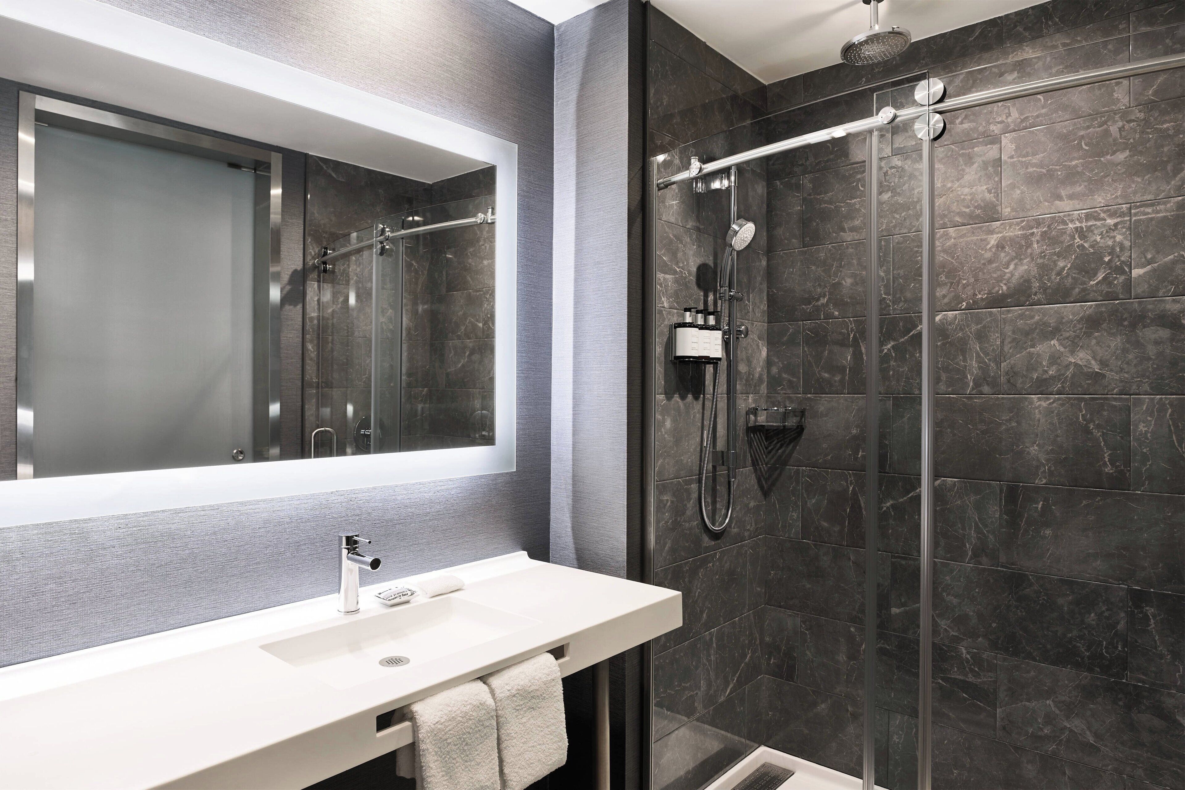 rainfall showerhead, free toiletries, hair dryer, towels