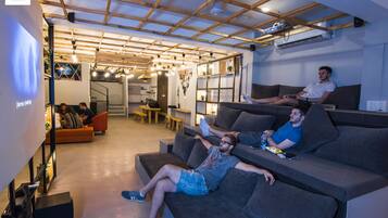 Relax in a casual lounge area with comfortable seating and modern decor.