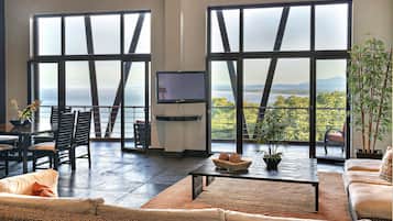 Luxury Penthouse | Living area | 55-inch LED TV with cable channels, TV