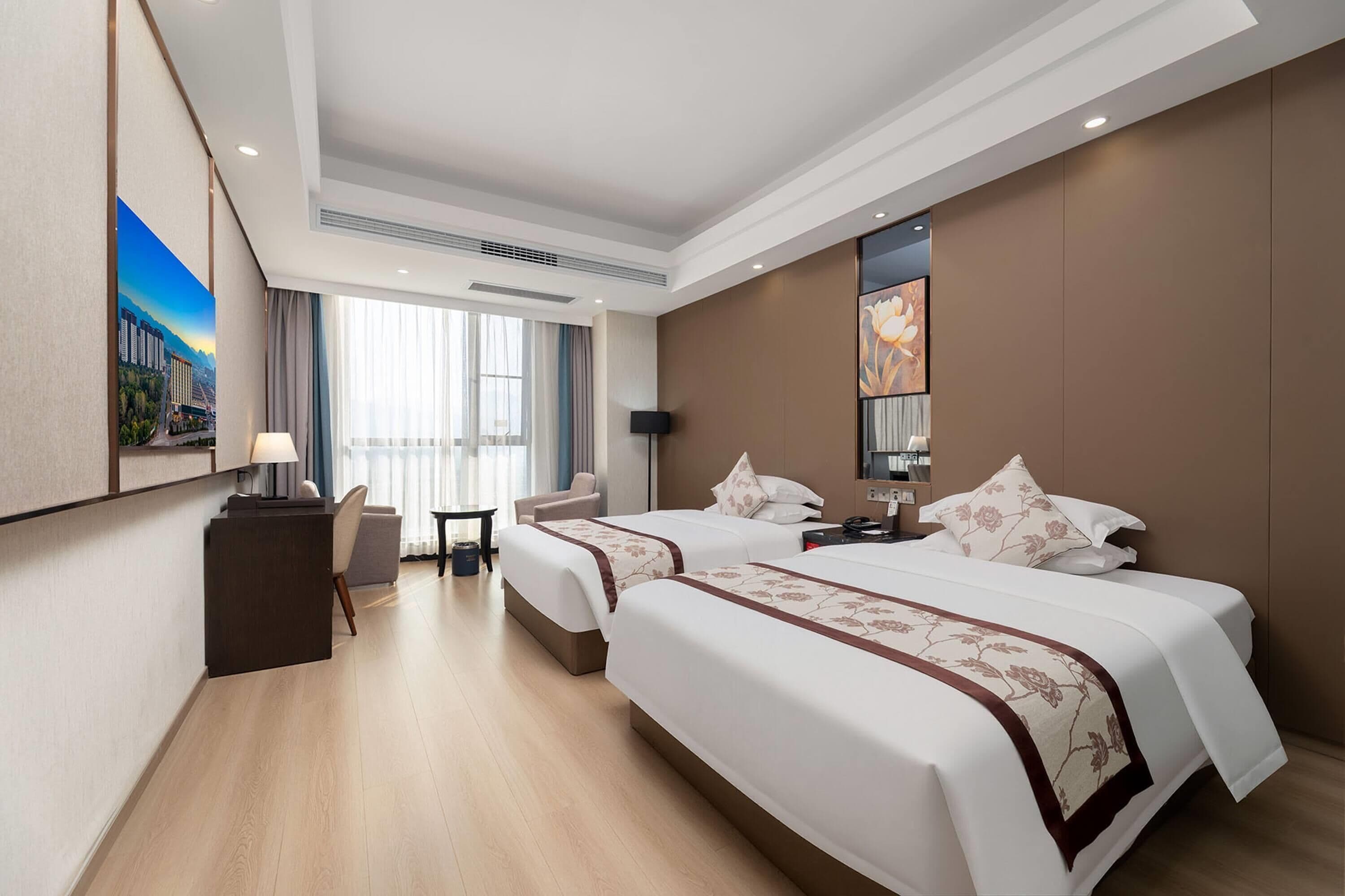 Chambre Deluxe, 2 lits doubles, fumeur | Accès au Wi-Fi (inclus), literie fournie