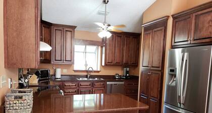 Private Getaway with Screened Pool, Upscale Kitchen, & Large Private Fenced Yard