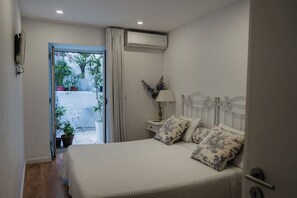 Family Apartment, 2 Bedrooms | Individually decorated, individually furnished, blackout drapes