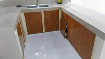 Fridge, stovetop, electric kettle, toaster